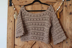 Pull crochet épaules dénudées