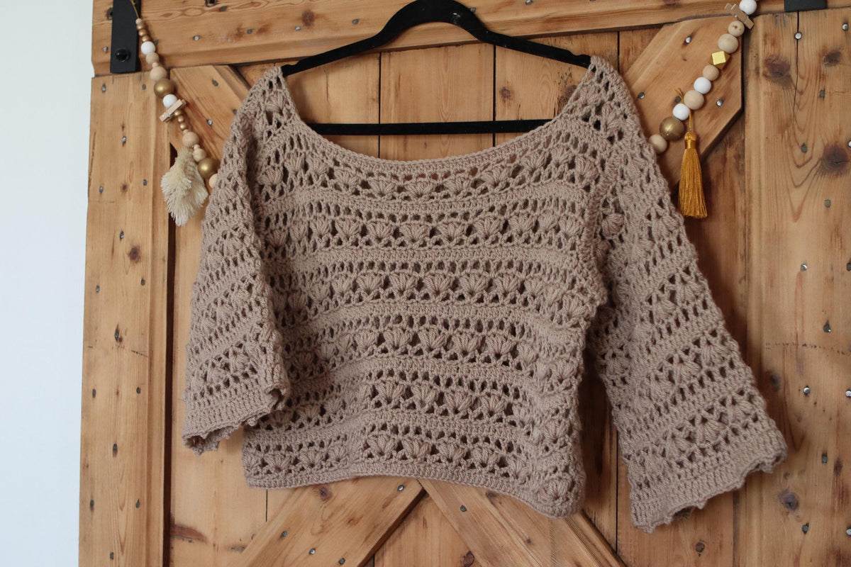 Pull crochet épaules dénudées